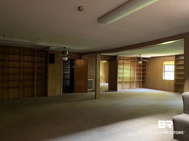 103 Briarcliff Road Brewton, AL 36426 - Photo 7 of 7 Interior space with carpet, wooden walls, and ceiling fan