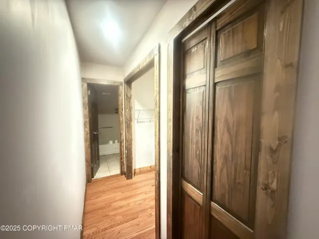 a view of an empty room and window