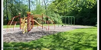 a view of a living room and entryway