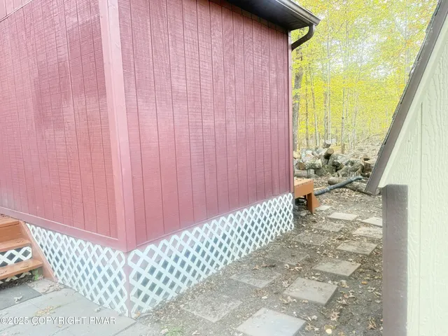 a view of a pathway gate with a street view
