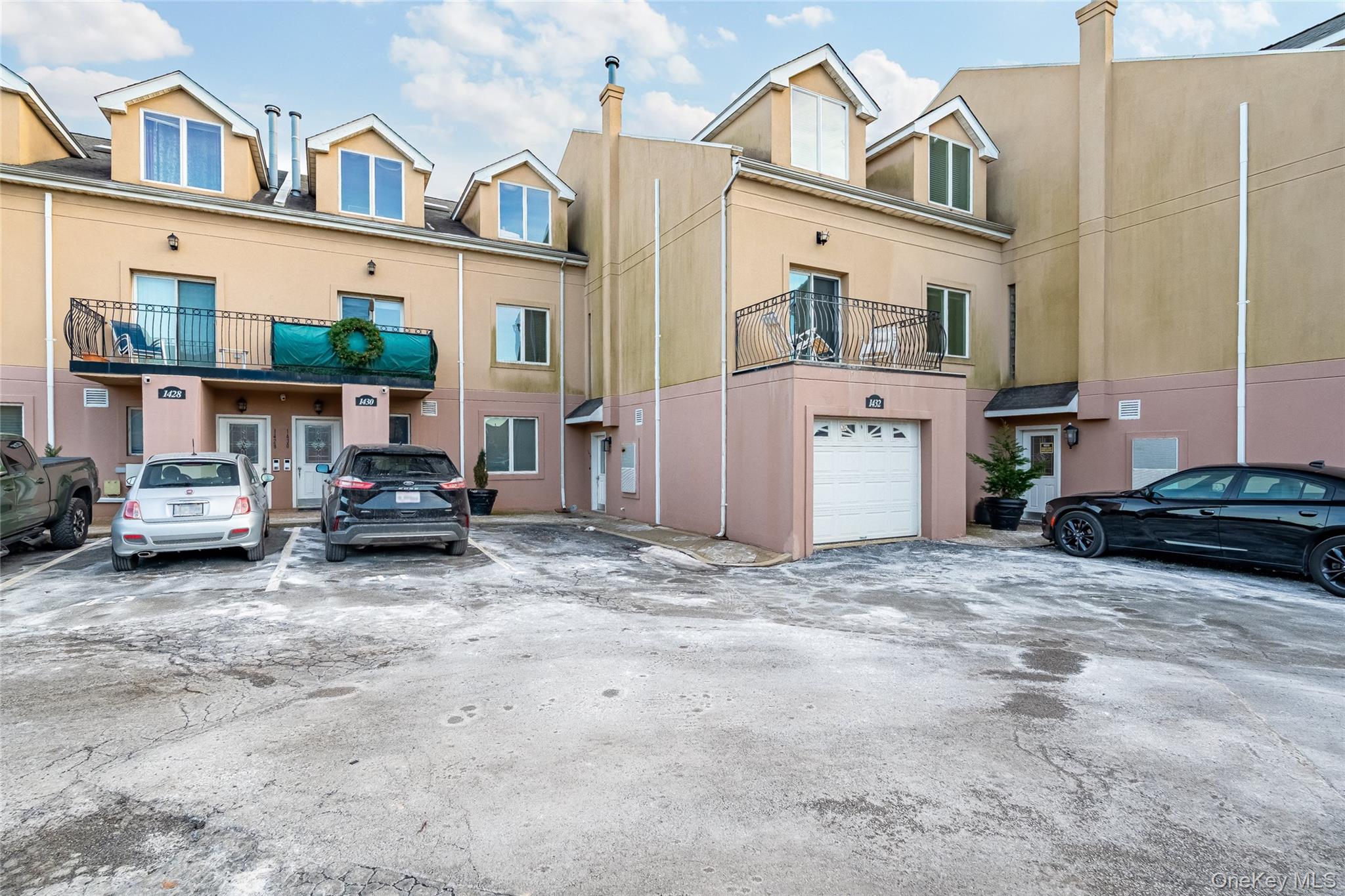 1432 Outlook Avenue, Unit 2 Bronx, NY 10465 - Photo 1 of 39 a view of a street with cars