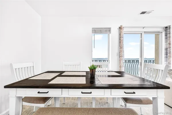 a living room with a sink and a window