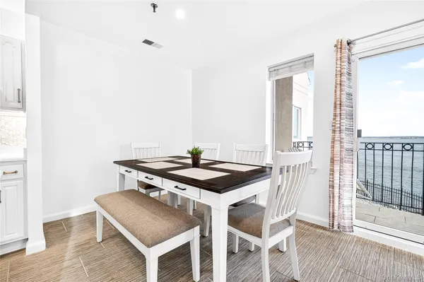 a white table and chairs in a room