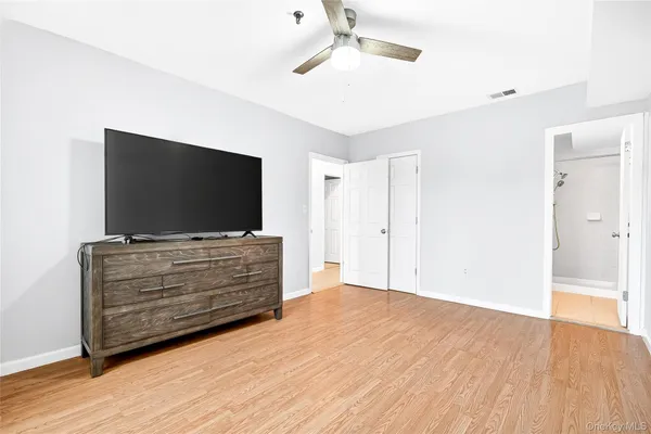 a room with furniture and flat screen tv