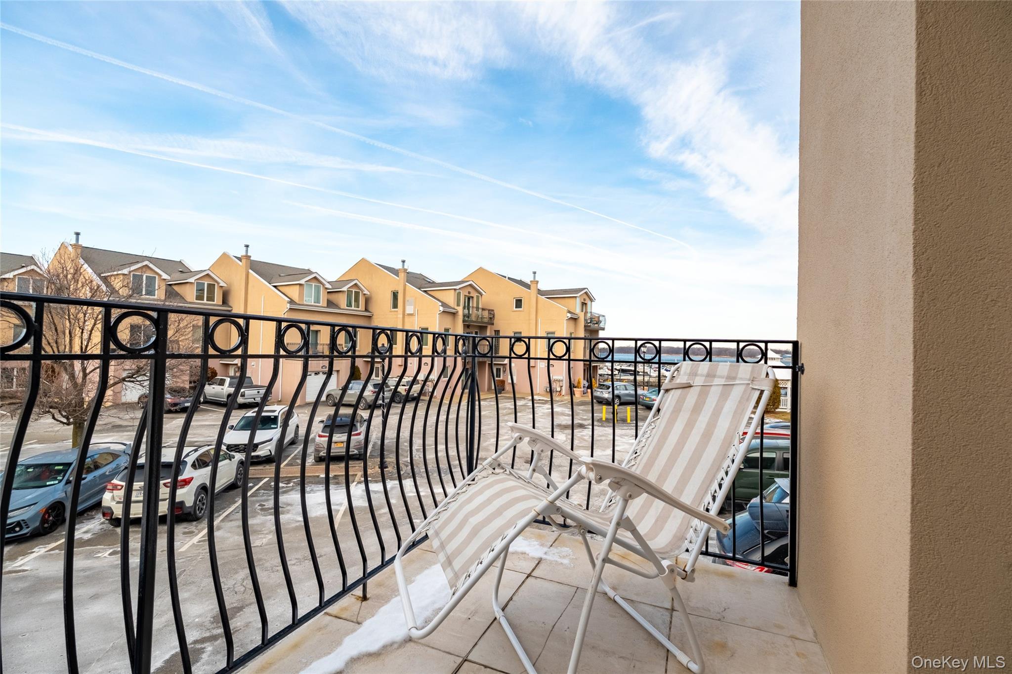 1432 Outlook Avenue, Unit 2 Bronx, NY 10465 - Photo 29 of 39 a view of a balcony with wooden floor