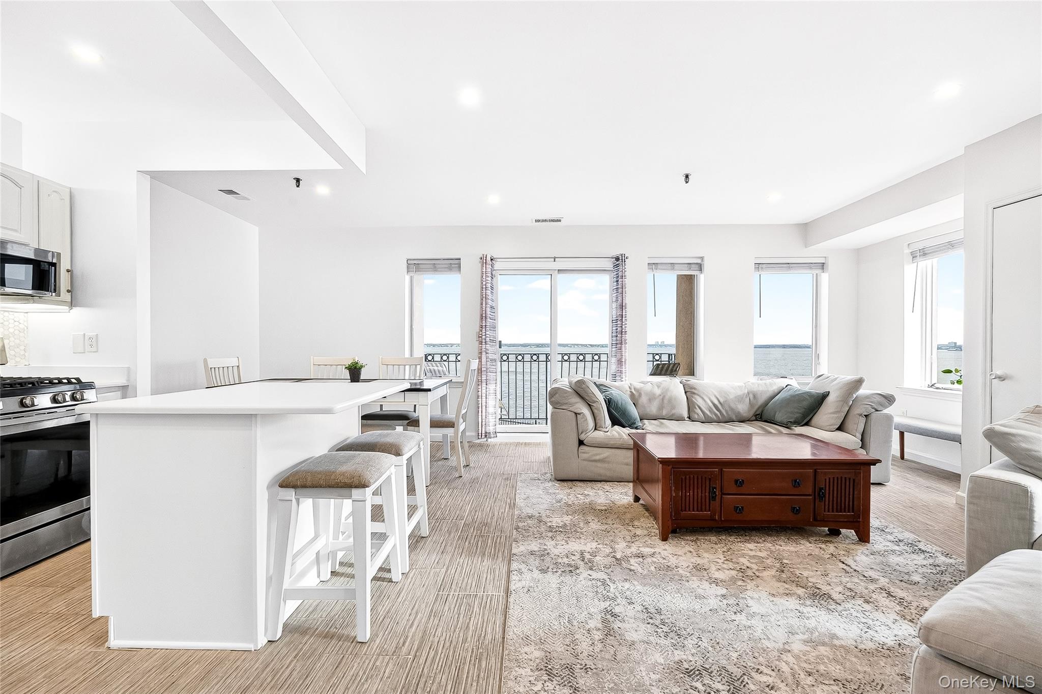 1432 Outlook Avenue, Unit 2 Bronx, NY 10465 - Photo 3 of 39 a living room with furniture and a large window