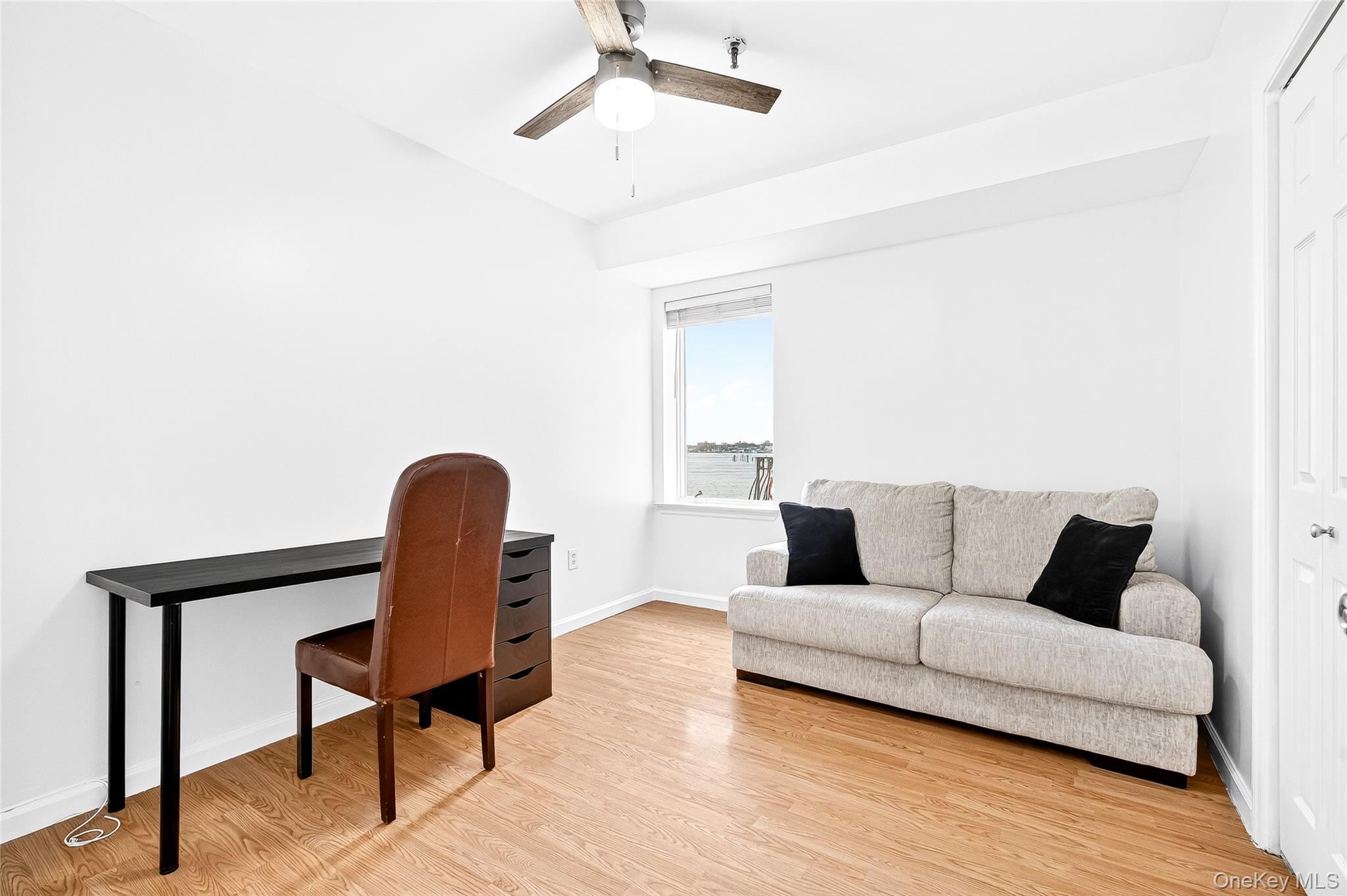 1432 Outlook Avenue, Unit 2 Bronx, NY 10465 - Photo 31 of 39 a living room with furniture