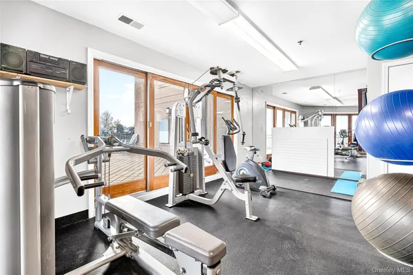 a view of a room with gym equipment