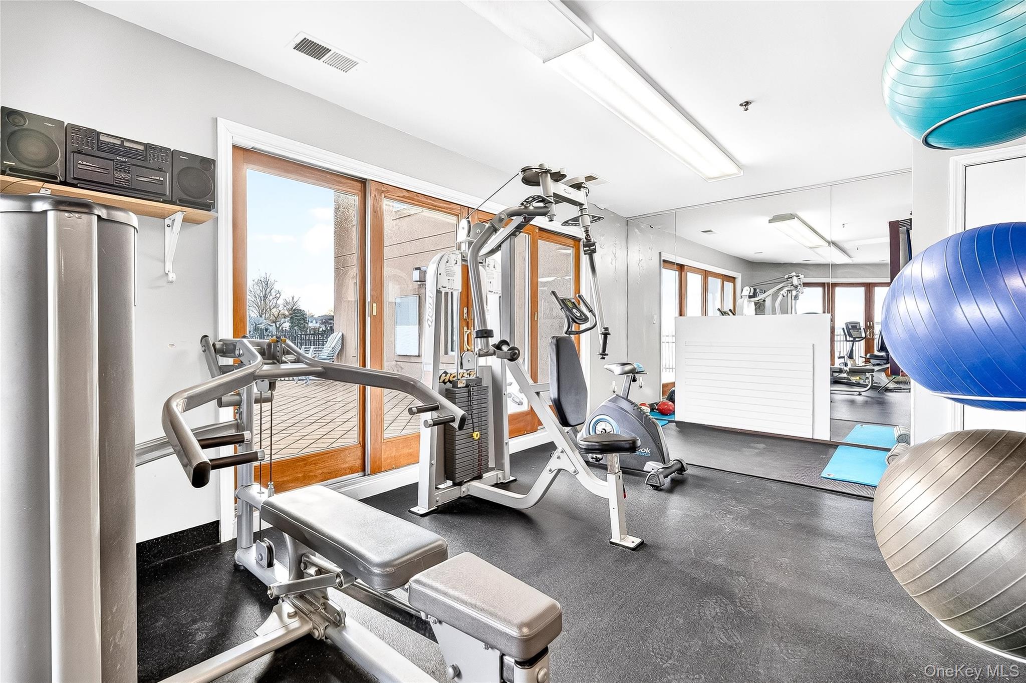 1432 Outlook Avenue, Unit 2 Bronx, NY 10465 - Photo 39 of 39 a view of a room with gym equipment
