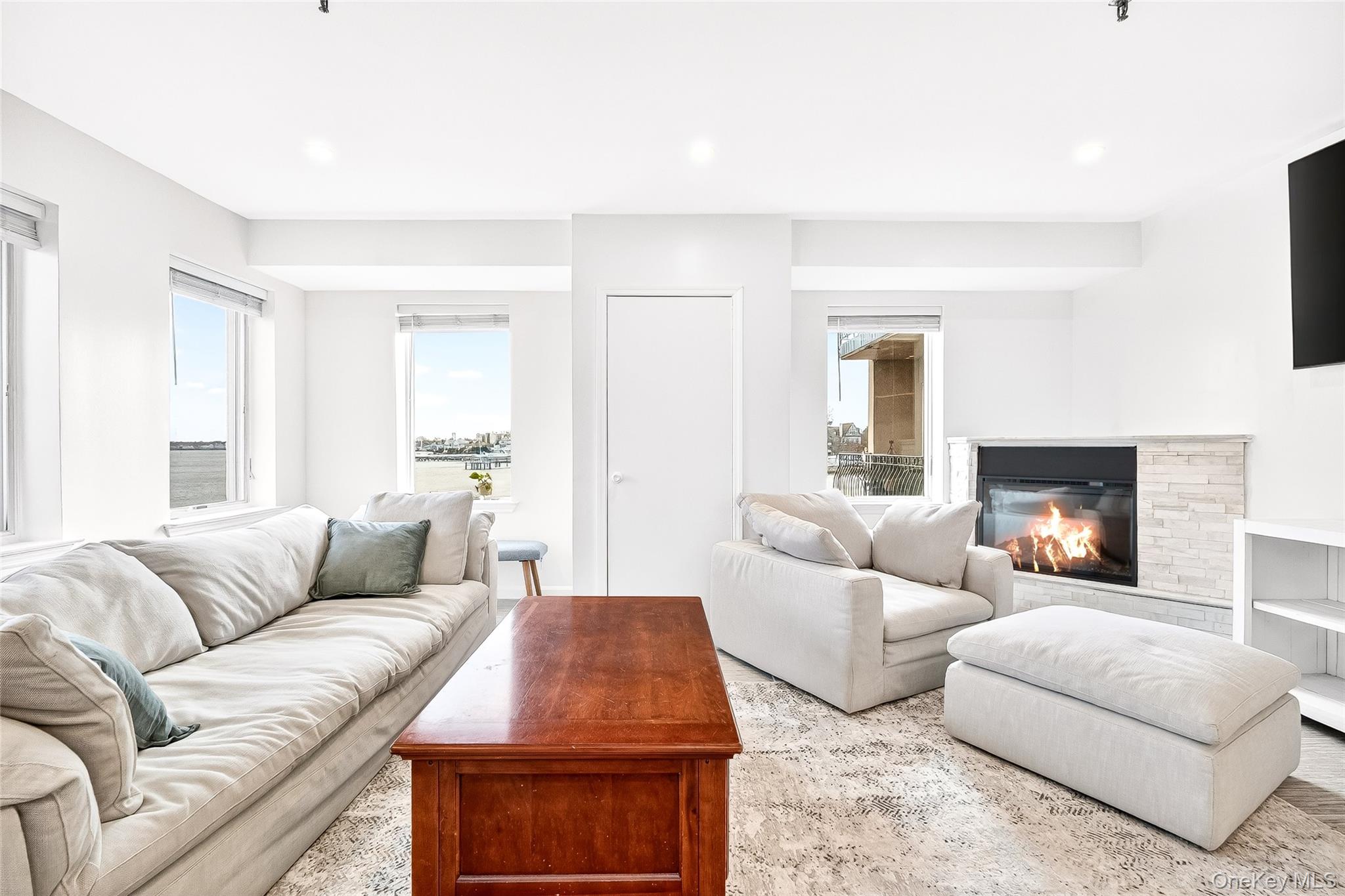 1432 Outlook Avenue, Unit 2 Bronx, NY 10465 - Photo 6 of 39 a living room with furniture and a couch