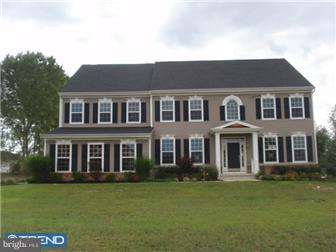 51 Curtmantle Road Mickleton, NJ 08056 - Photo 1 of 12 a front view of a house with a garden