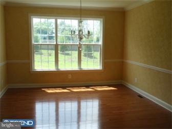 51 Curtmantle Road Mickleton, NJ 08056 - Photo 6 of 12 a view of an empty room with a window