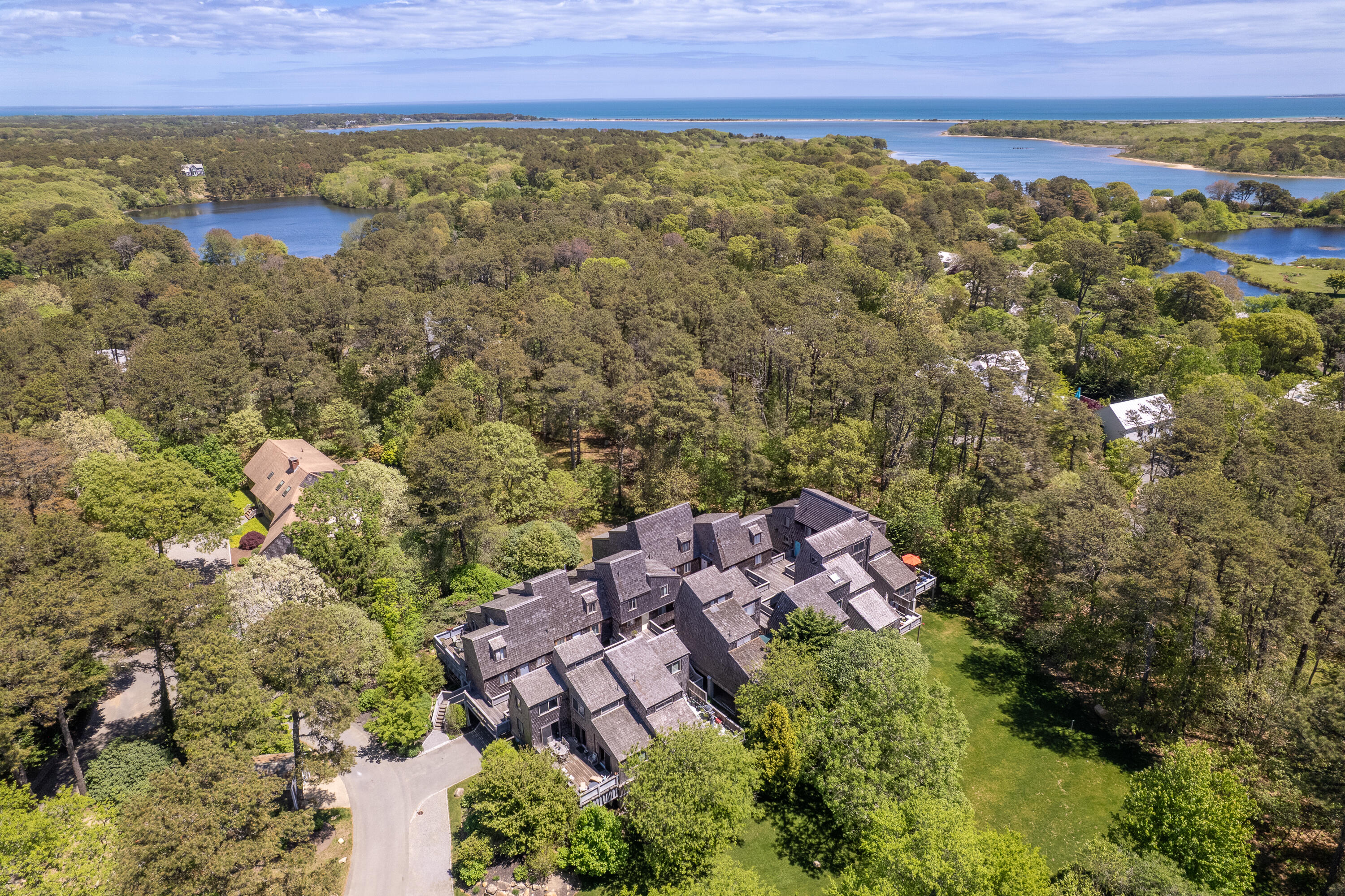 4 Quail Run Road, Unit 7 Oak Bluffs, MA 02557 - Photo 1 of 32 End unit abuts a large park area