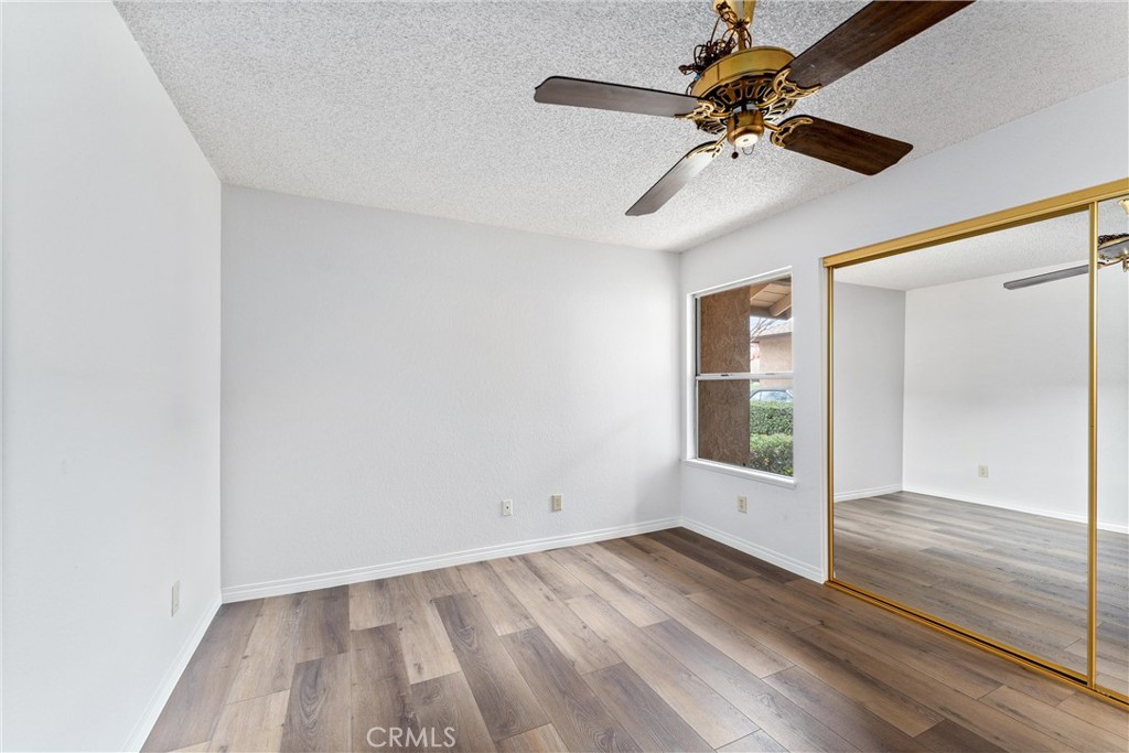 1159 Stone Pine Lane, Unit C Corona, CA 92879 - Photo 14 of 25 a view of empty room with wooden floor
