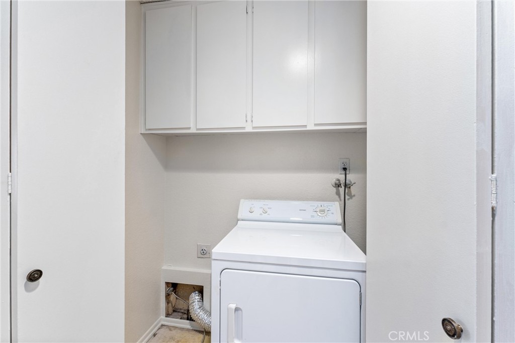 1159 Stone Pine Lane, Unit C Corona, CA 92879 - Photo 17 of 25 a utility room with dryer and washer