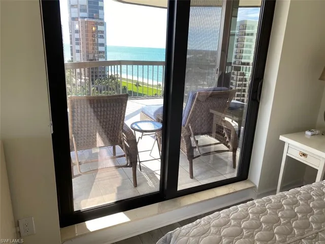a view of a livingroom with furniture and window