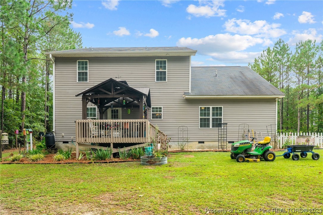 376 Tactical Drive Bunnlevel, NC 28323 - Photo 2 of 46 a front view of house with yard and green space