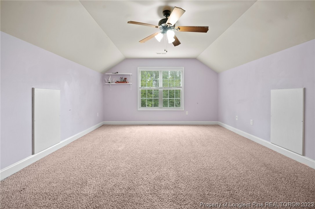 376 Tactical Drive Bunnlevel, NC 28323 - Photo 23 of 46 wooden floor in an empty room with a window