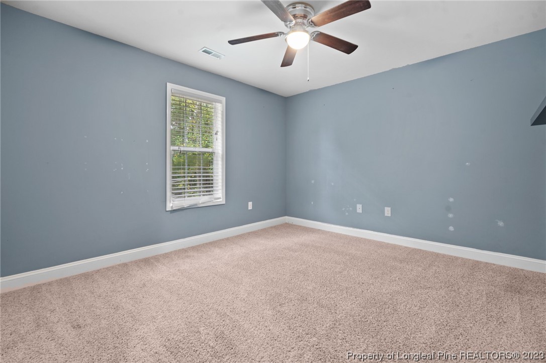 376 Tactical Drive Bunnlevel, NC 28323 - Photo 24 of 46 a view of an empty room with a window