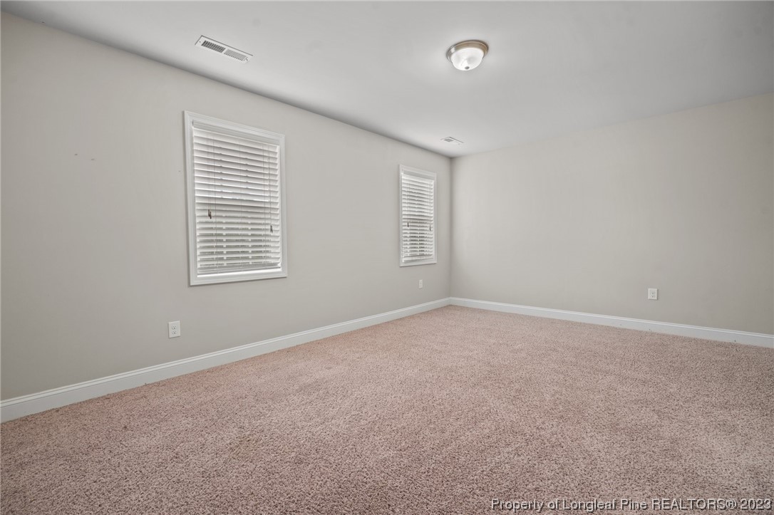 376 Tactical Drive Bunnlevel, NC 28323 - Photo 27 of 46 an empty room with windows