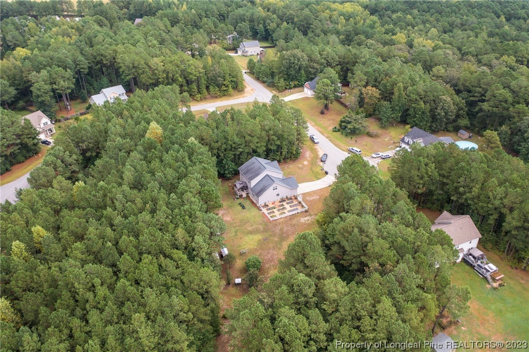 376 Tactical Drive Bunnlevel, NC 28323 - Photo 7 of 46 an aerial view of residential house with outdoor space and trees all around