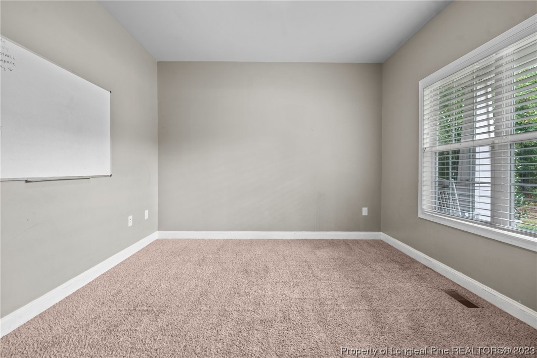 376 Tactical Drive Bunnlevel, NC 28323 - Photo 9 of 46 a view of an empty room with a window