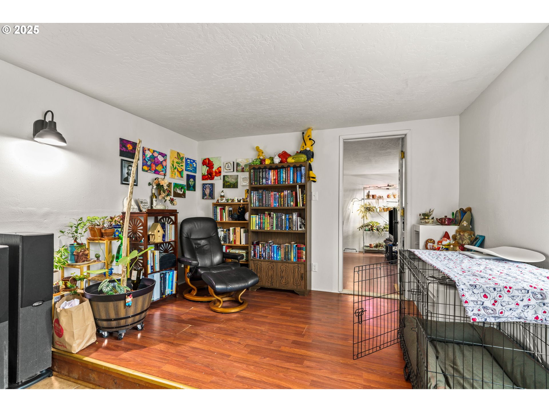 5736 A Street Springfield, OR 97478 - Photo 6 of 26 a living room with furniture a flat screen tv and a table