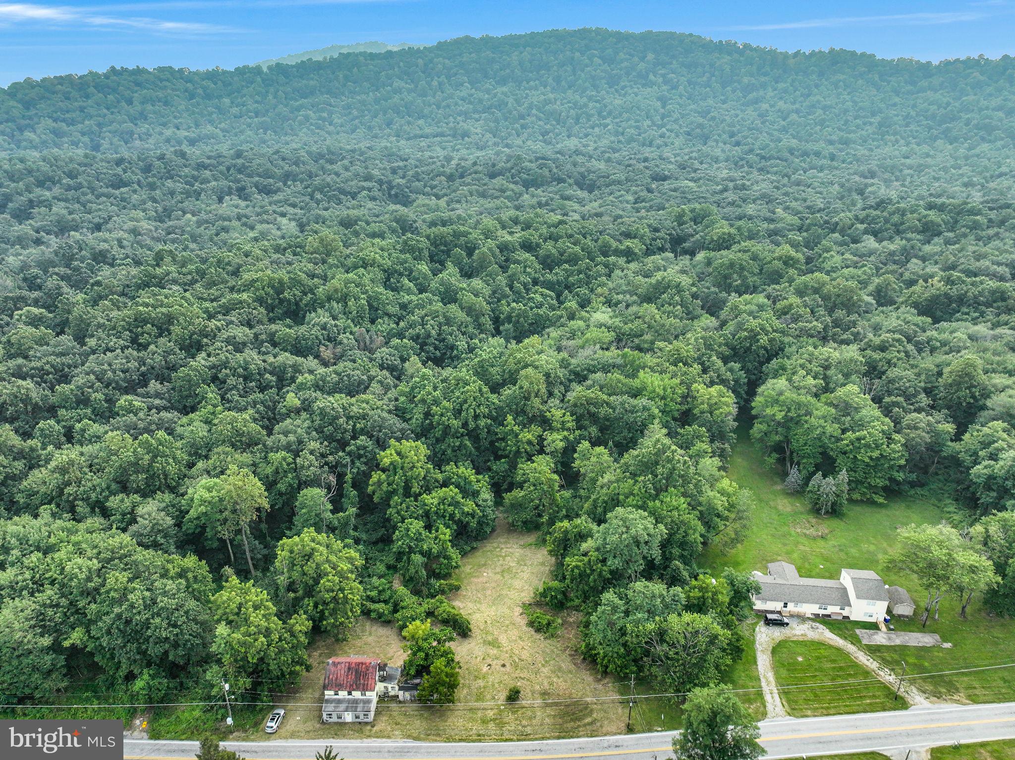 867 Pinetown Road Lewisberry, PA 17339 - Photo 1 of 18 an aerial view of residential houses with outdoor space and trees