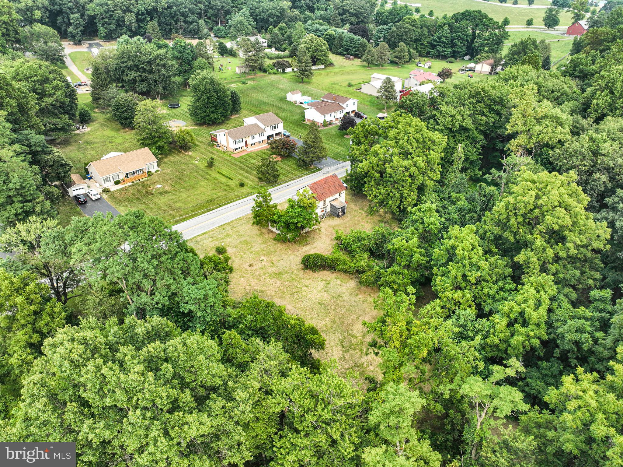 867 Pinetown Road Lewisberry, PA 17339 - Photo 2 of 18 an aerial view of residential houses with outdoor space and trees