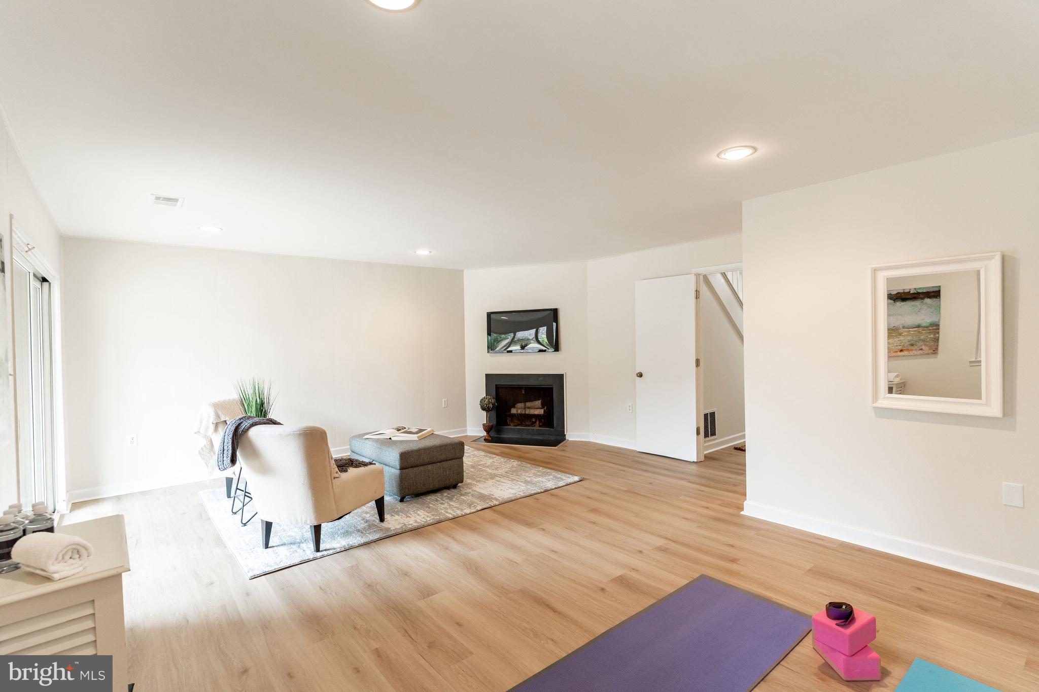 8155 Inverness Ridge Road Potomac, MD 20854 - Photo 19 of 22 Recreation Room with Wood Burning Fireplace
