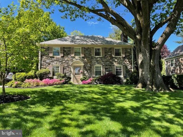 stone colonial with tremendous curb appeal
