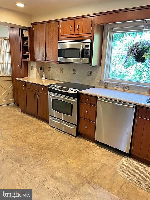 large kitchen / wood cabinetry & silestone counter