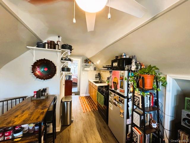 244 East Hudson Street, Unit UPPR Long Beach, NY 11561 - Photo 9 of 12 a view of a dining room with furniture and wooden floor