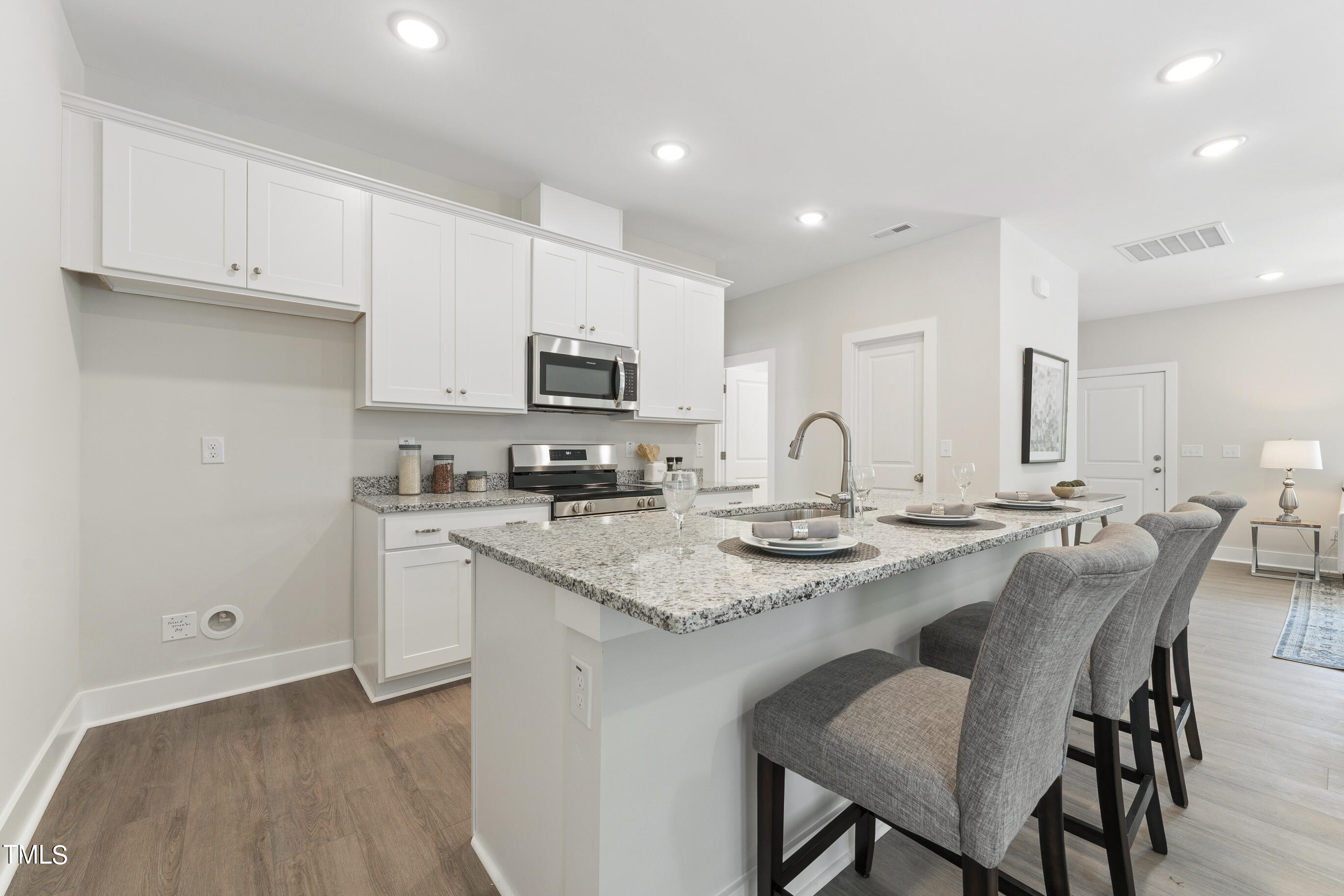 25 Chester Lane Middlesex, NC 27557 - Photo 11 of 32 a kitchen with appliances a sink and cabinets