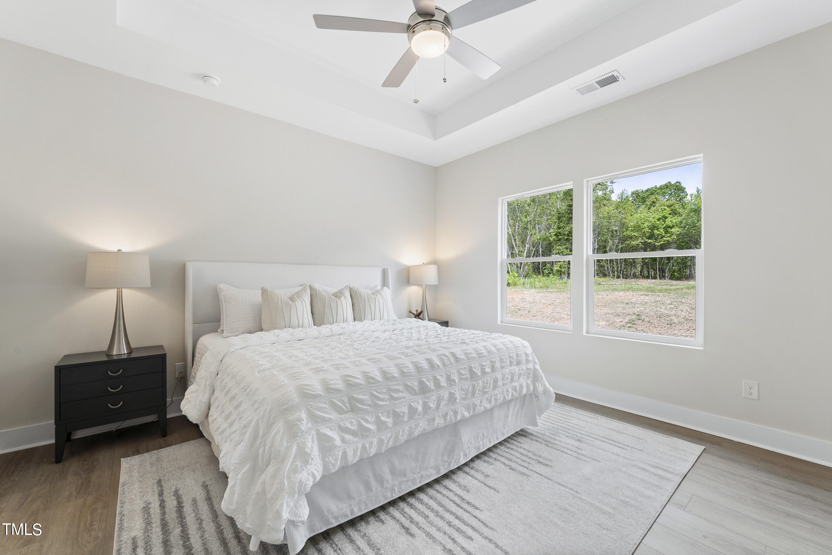 25 Chester Lane Middlesex, NC 27557 - Photo 15 of 32 a bedroom with a bed and a window