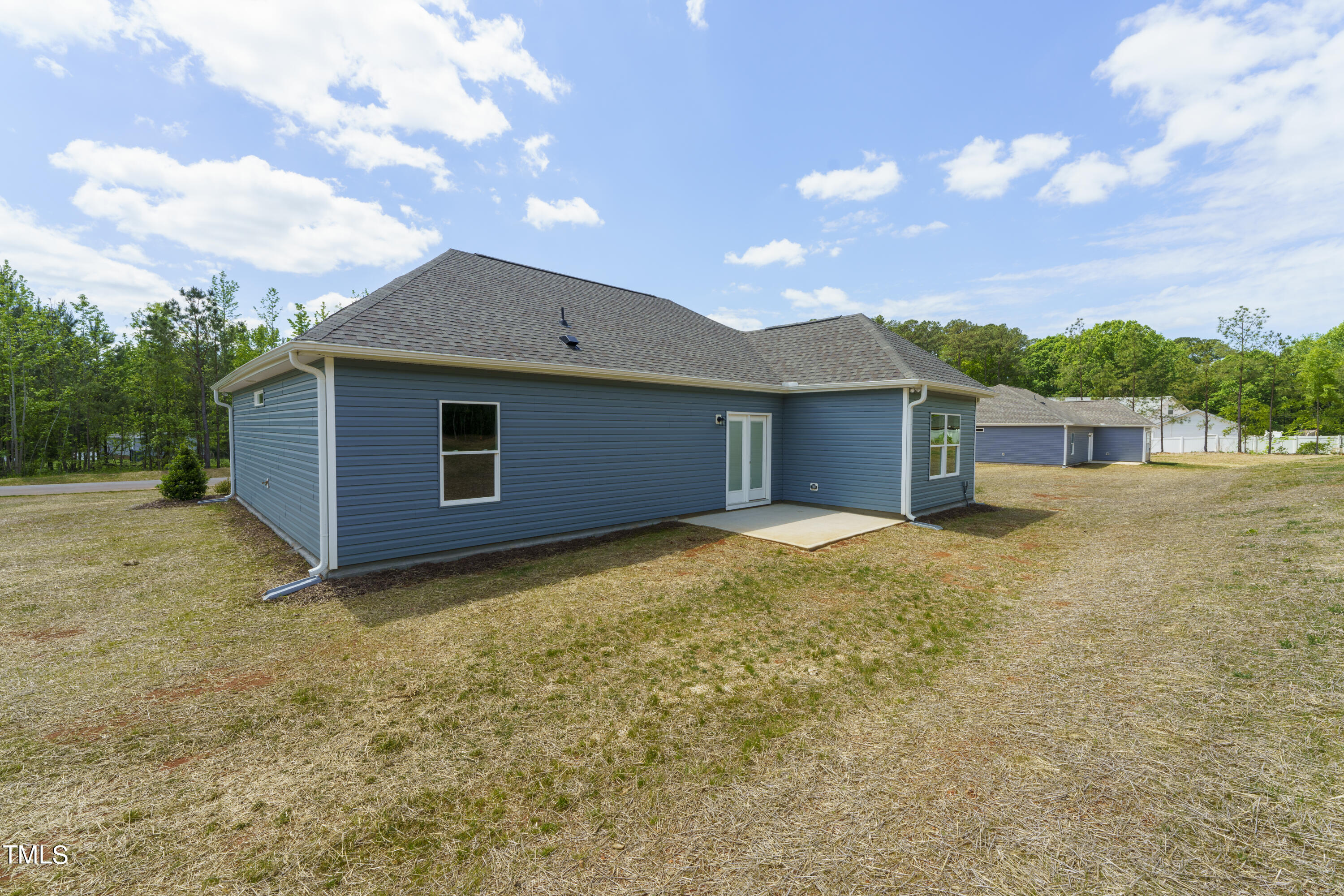 25 Chester Lane Middlesex, NC 27557 - Photo 29 of 32 a view of a house with backyard and garden