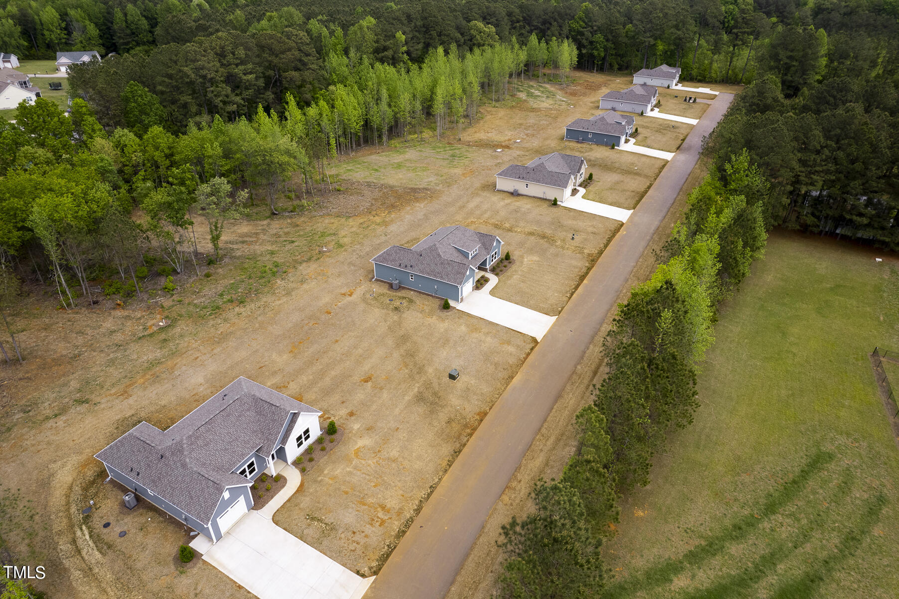 25 Chester Lane Middlesex, NC 27557 - Photo 32 of 32 an aerial view of house with yard swimming pool and outdoor seating
