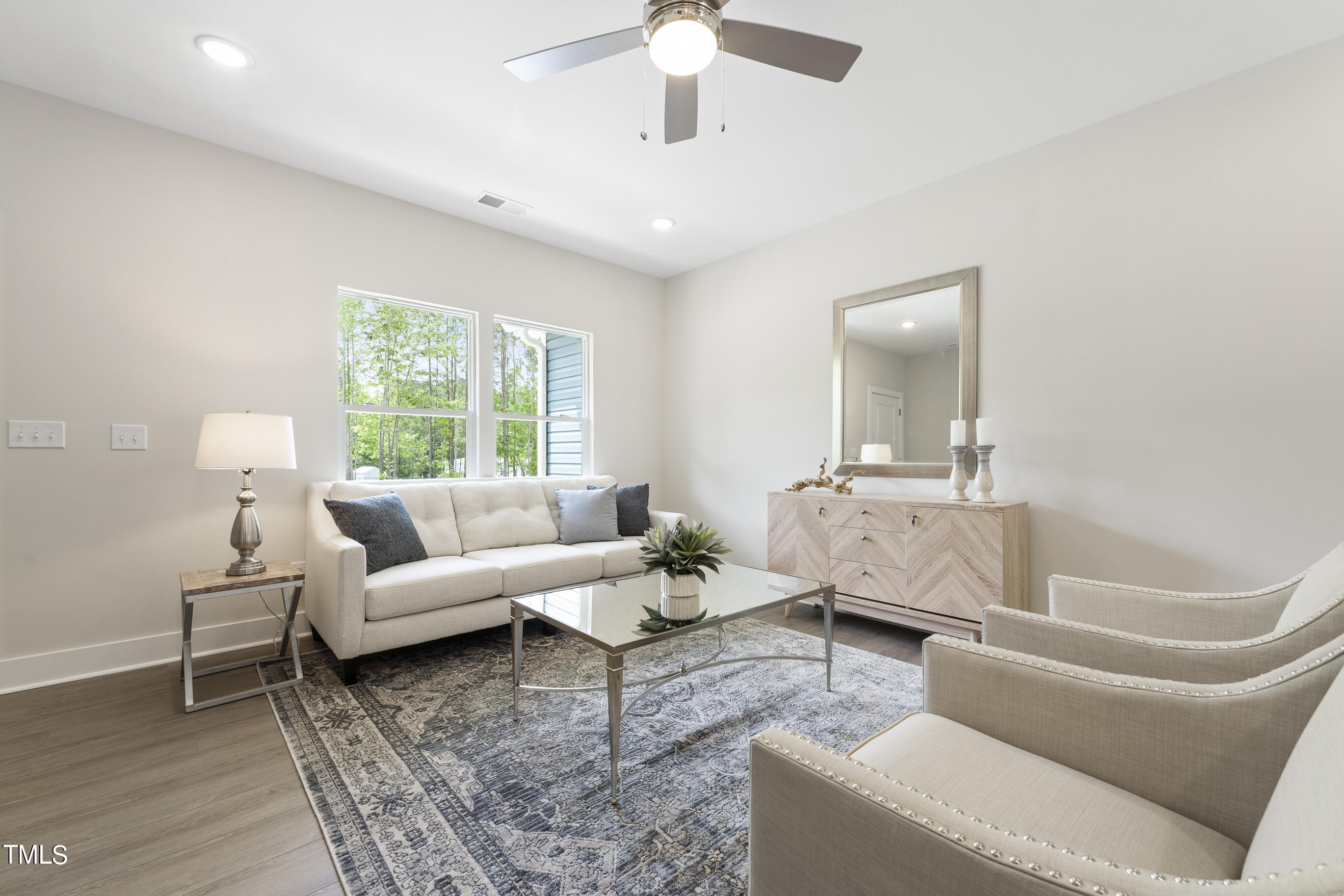 25 Chester Lane Middlesex, NC 27557 - Photo 4 of 32 a living room with furniture and a large window