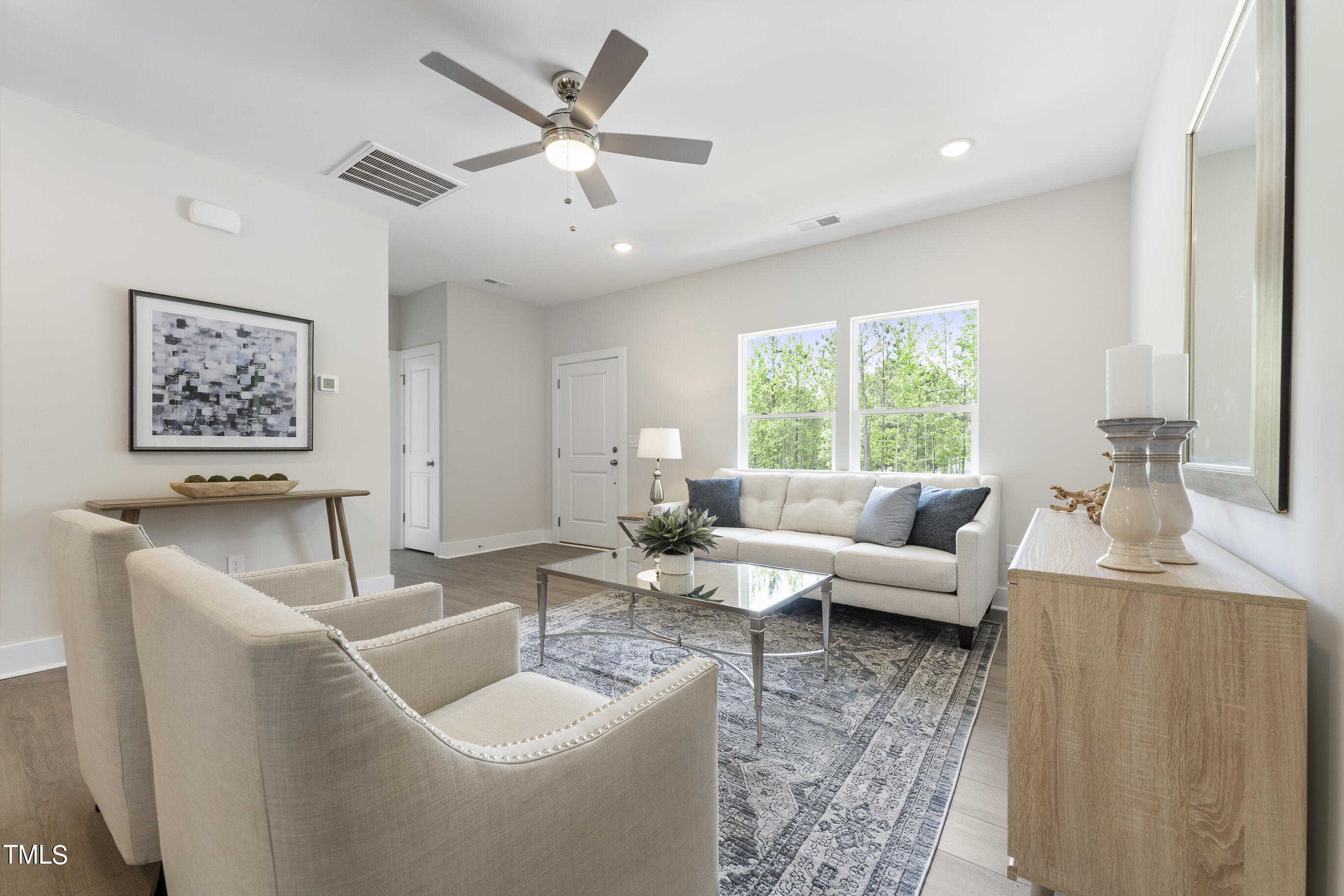 25 Chester Lane Middlesex, NC 27557 - Photo 5 of 32 a living room with furniture and a large window