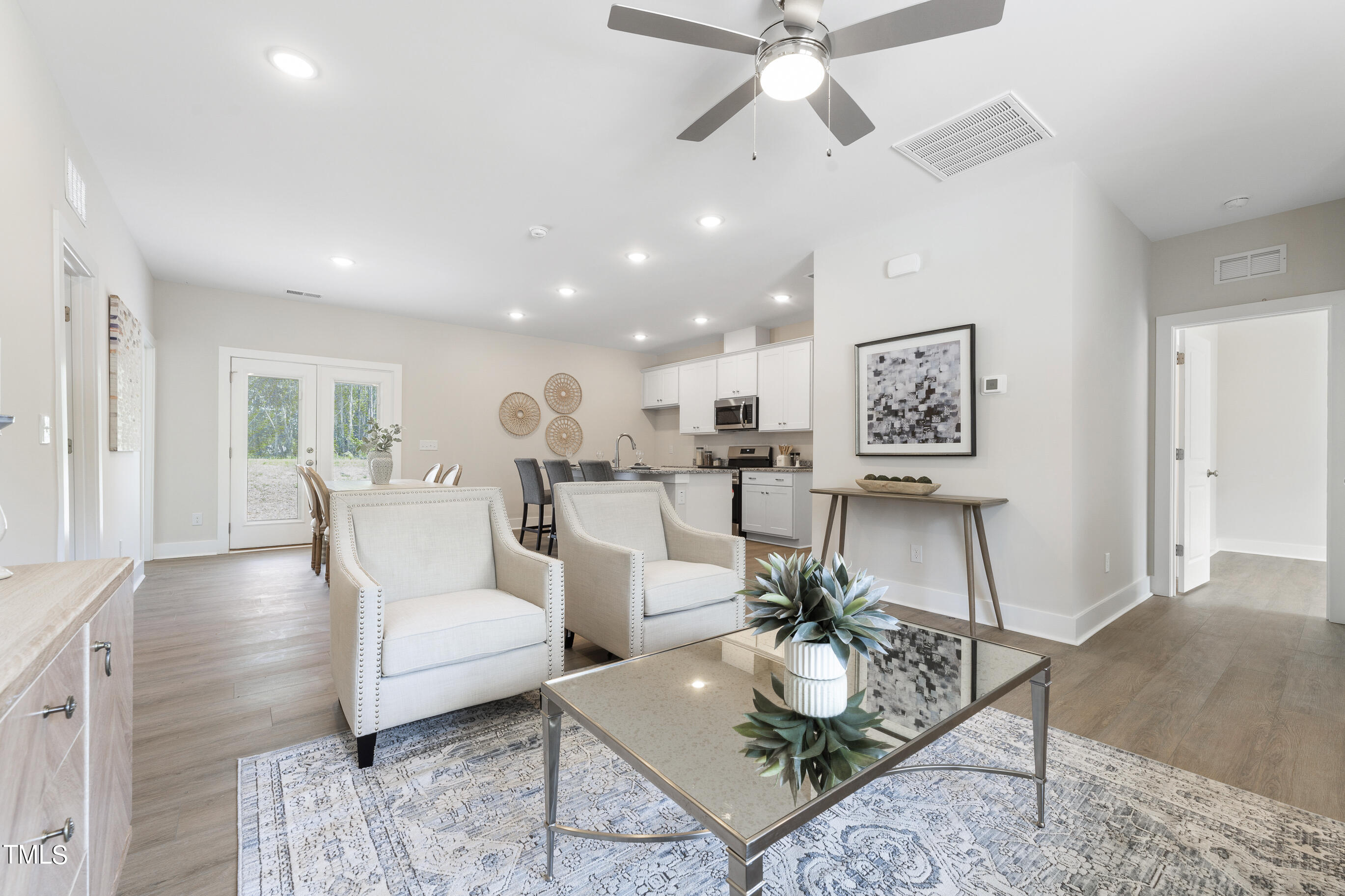 25 Chester Lane Middlesex, NC 27557 - Photo 6 of 32 a living room with furniture and a view of kitchen