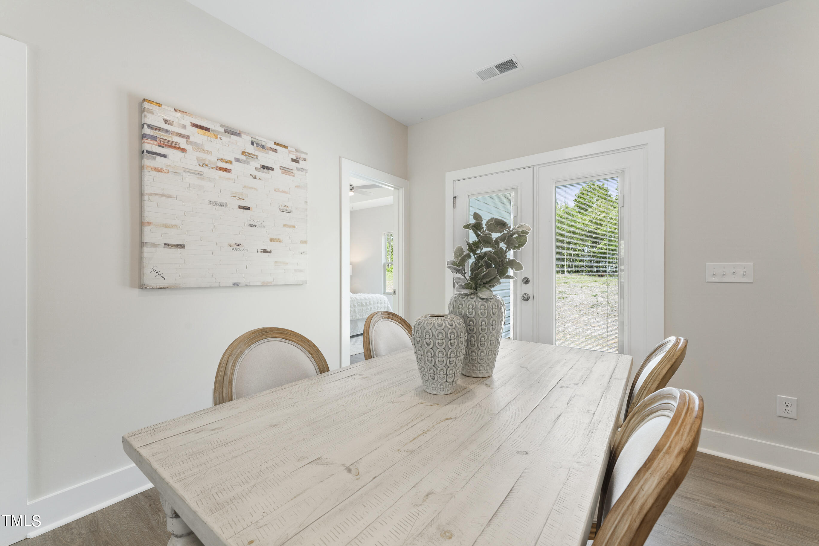 25 Chester Lane Middlesex, NC 27557 - Photo 9 of 32 a view of a dining room with furniture and wooden floor