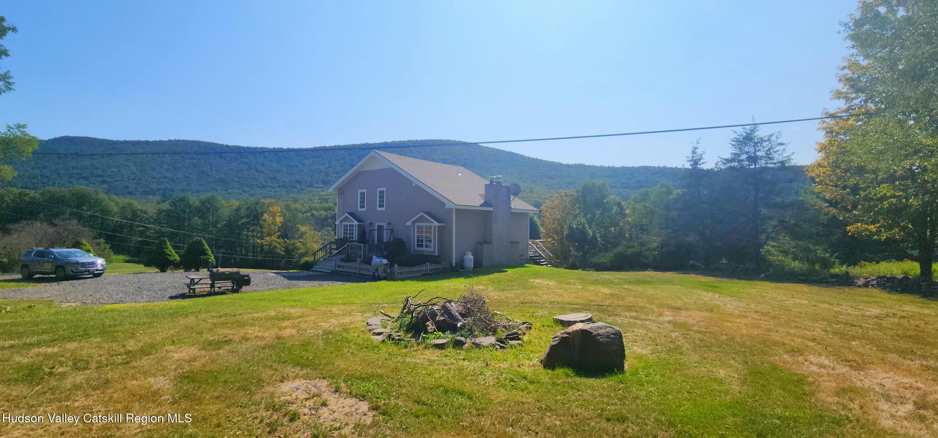 19 Pond View Road Ashland, NY 12468 - Photo 21 of 37 a view of swimming pool and mountain in the background