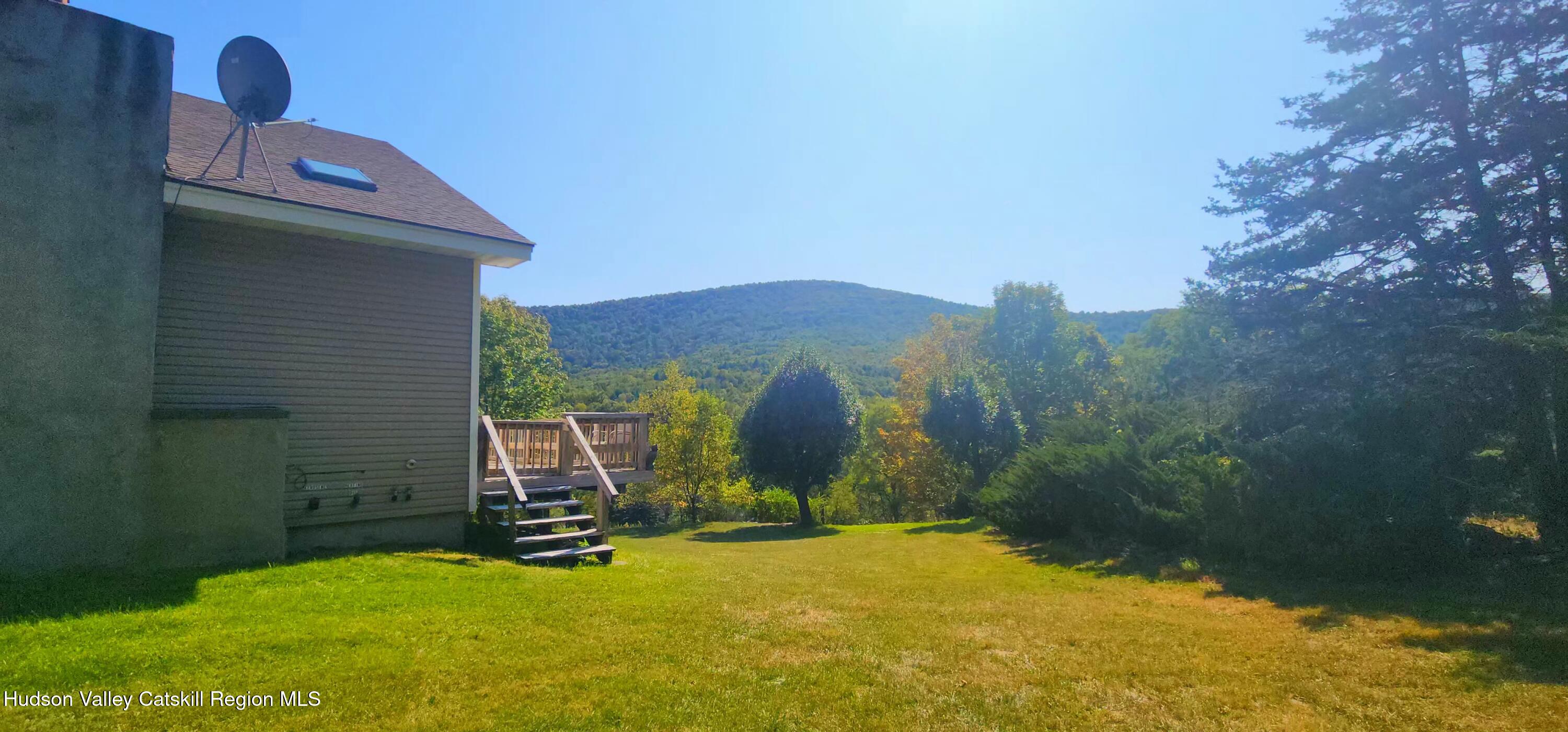 19 Pond View Road Ashland, NY 12468 - Photo 32 of 37 a view of a terrace with a yard