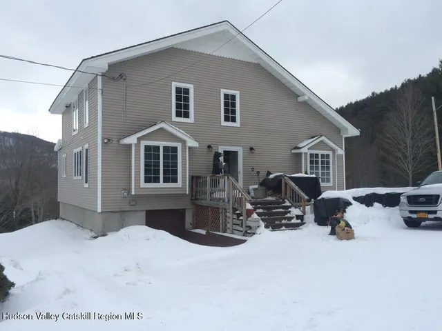 a front view of a house with patio