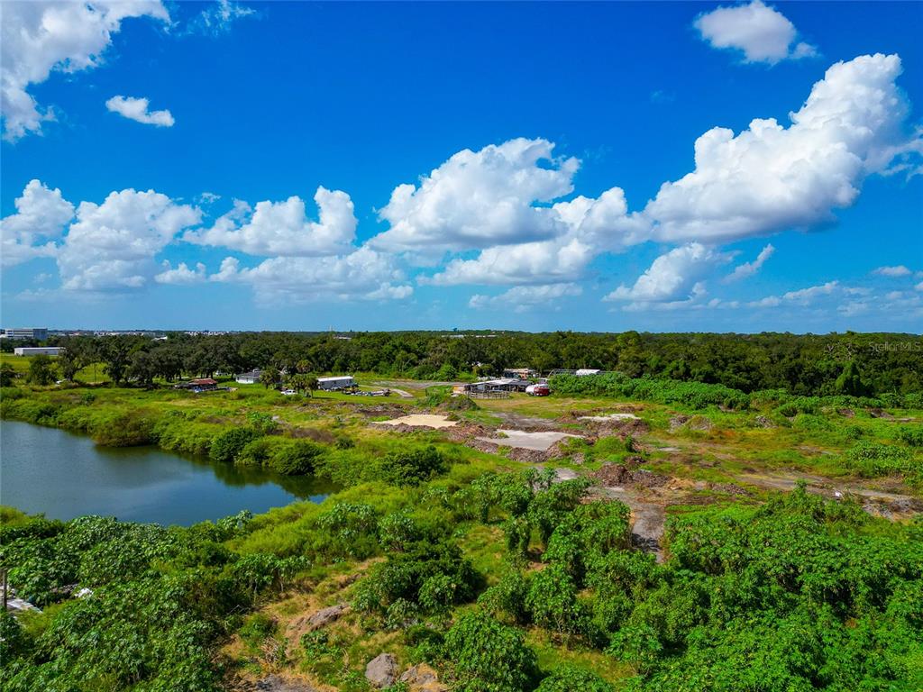 301 E Road Sarasota, FL 34240 - Photo 11 of 32 a view of a houses with a yard