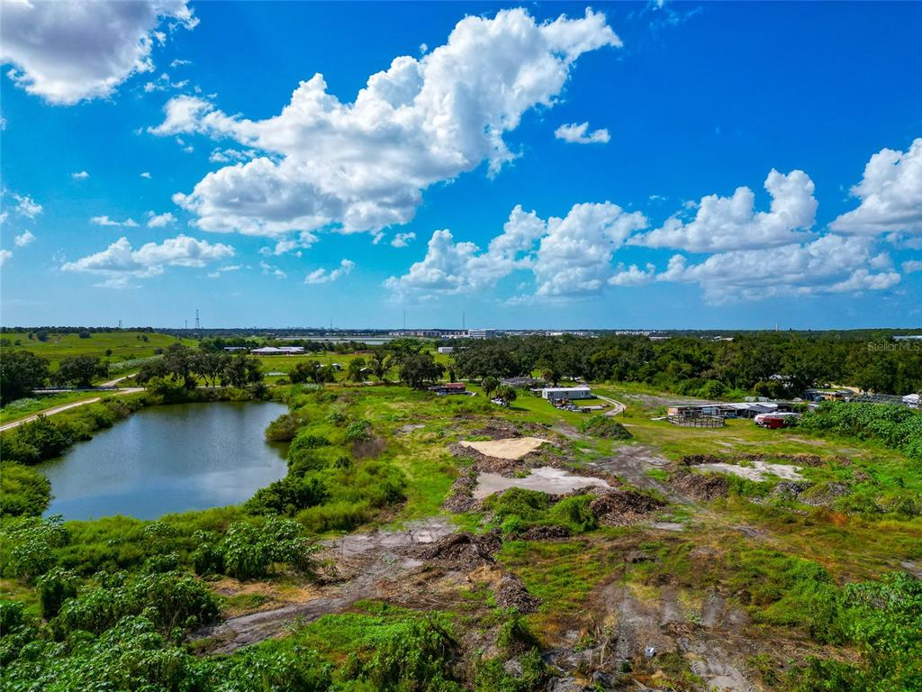 301 E Road Sarasota, FL 34240 - Photo 13 of 32 a view of a lake with houses