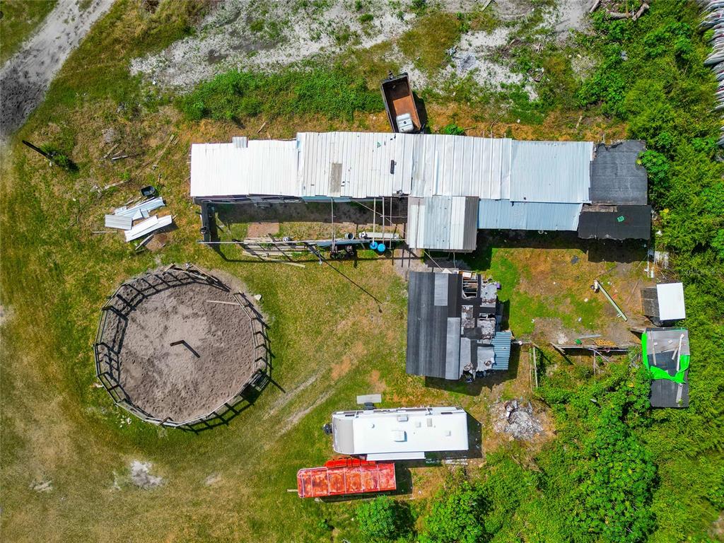 301 E Road Sarasota, FL 34240 - Photo 18 of 32 an aerial view of a house with yard swimming pool and outdoor seating