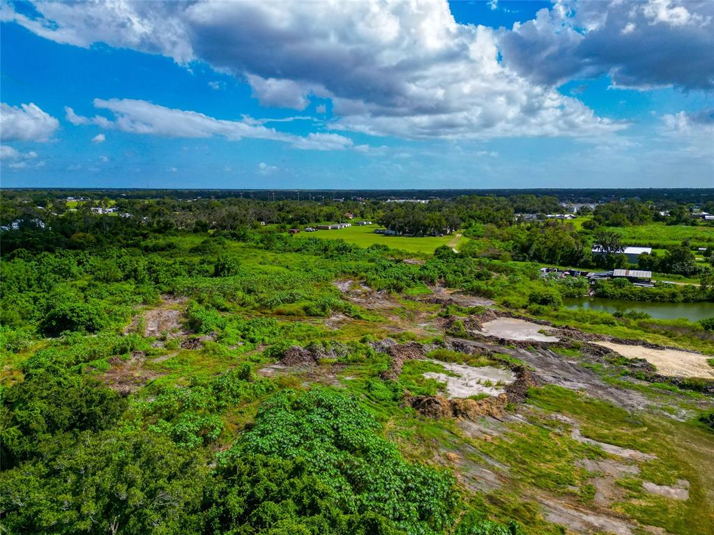 301 E Road Sarasota, FL 34240 - Photo 21 of 32 a view of a yard with an outdoor space
