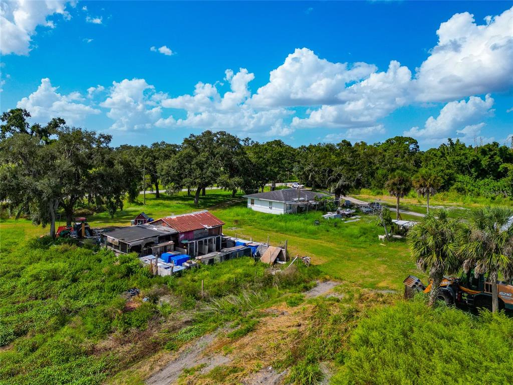 301 E Road Sarasota, FL 34240 - Photo 25 of 32 a view of a golf course with a play ground