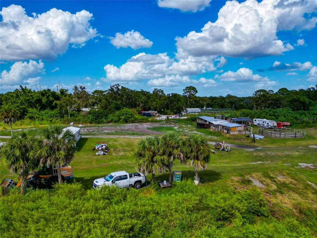 301 E Road Sarasota, FL 34240 - Photo 26 of 32 a view of a golf course with a lake view